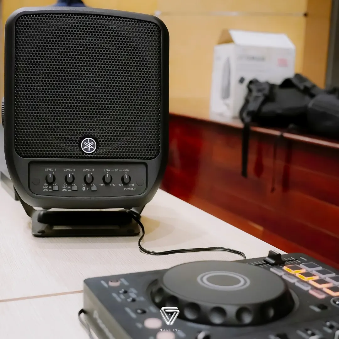 A young student trying scratching and beatmatching at the Kid DJ Workshop