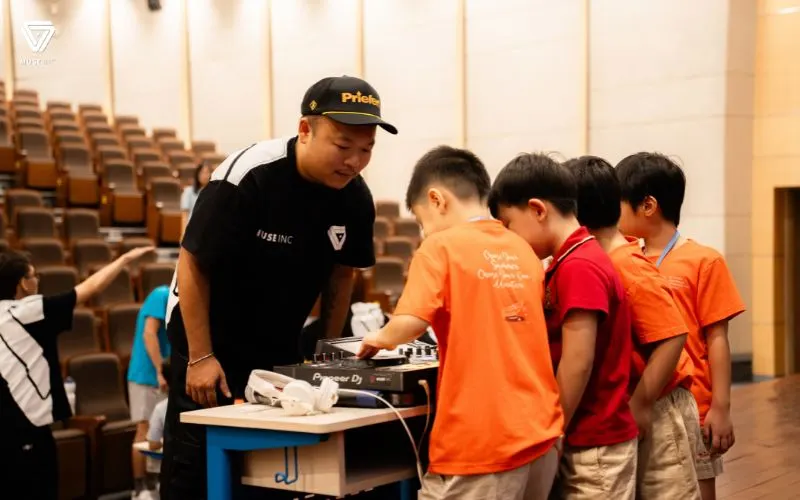Muse Inc instructors with students at Vietnam Australia International School