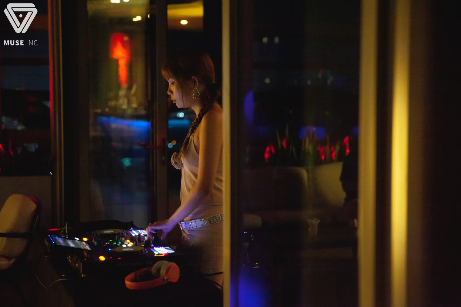 Young DJ practising on a controller