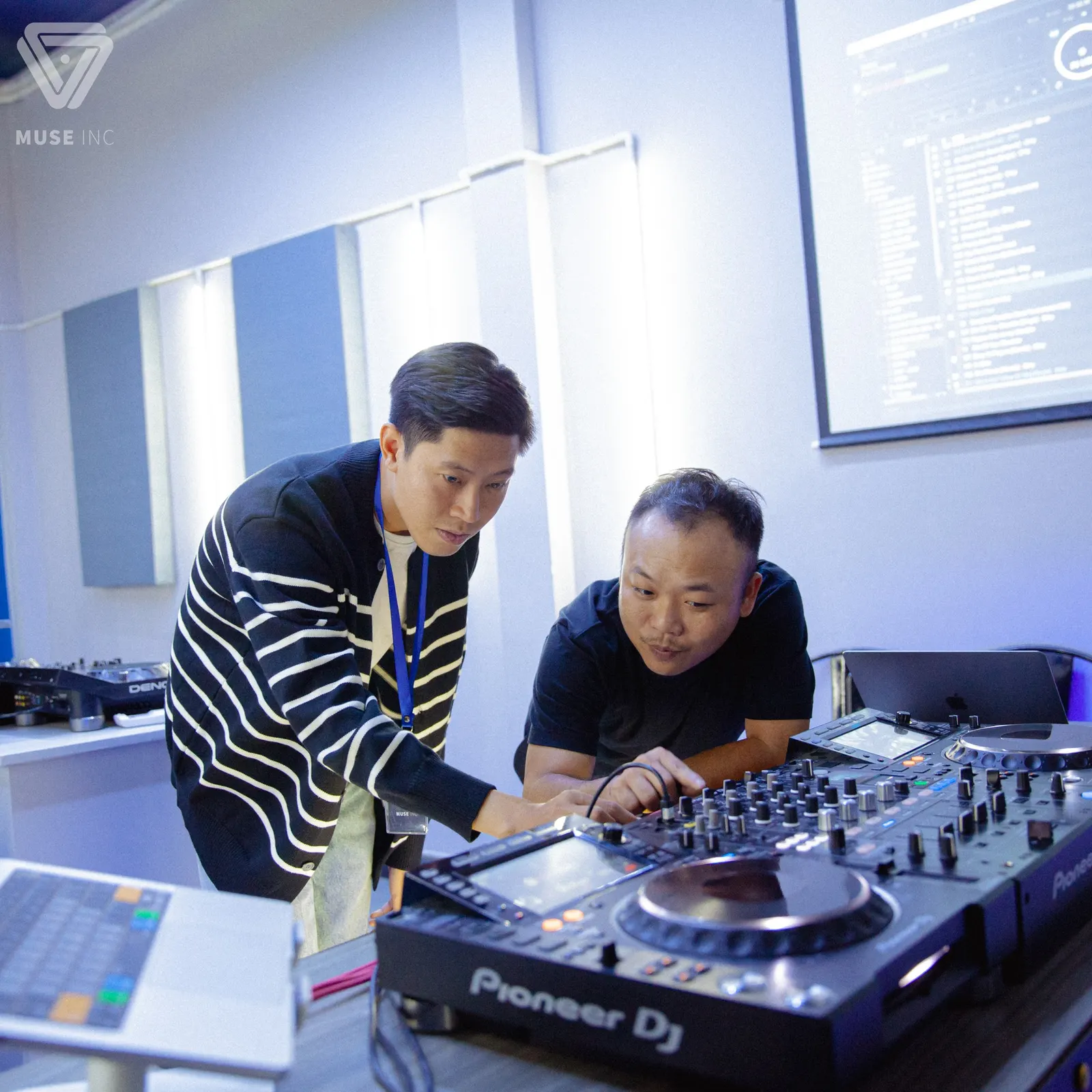 A student building confidence during a DJ lesson